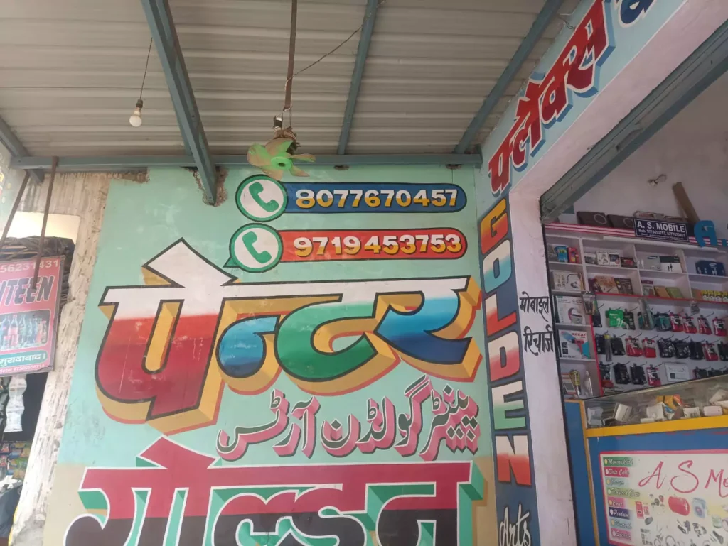 Indian Street Art that utilizes hand drawn typography and styles like gradients, 3D styles, three languages and multiple typefaces